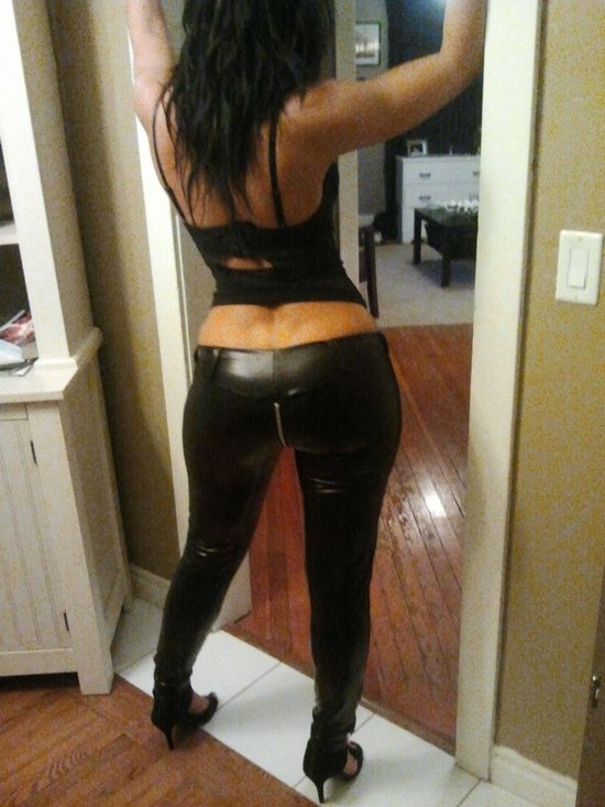 Wiffe posing in hot leather pants
