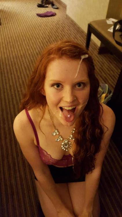 Amateur redhead on her knees is happy after a facial